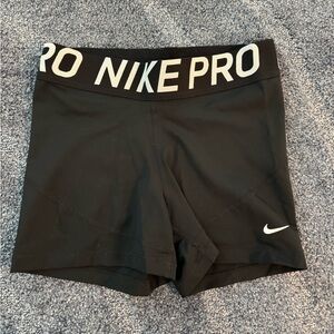 Black Nike pro spandex shorts.